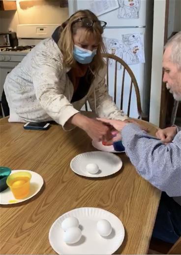 Jacque Anderson dyeing Easter eggs