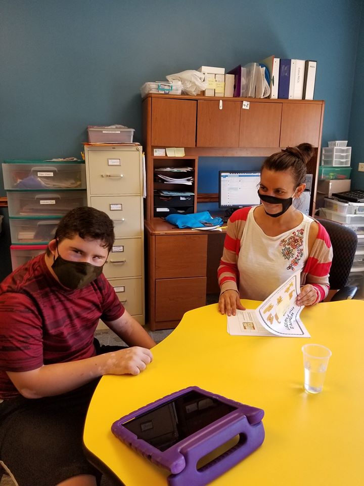 Student and teacher at Trinity school